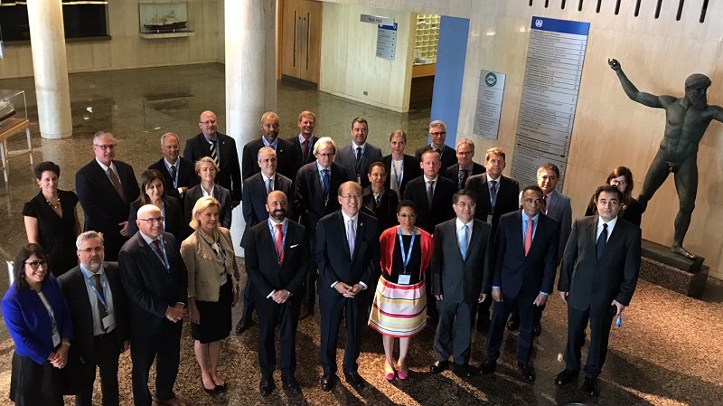IMO Secretary-General Kitack Lim joins the United Nations Legal Counsel, Mr. Serpa Soares, and the Members of the Network of Legal Advisers of the UN System for a group photo at the IMO Headquarters in London